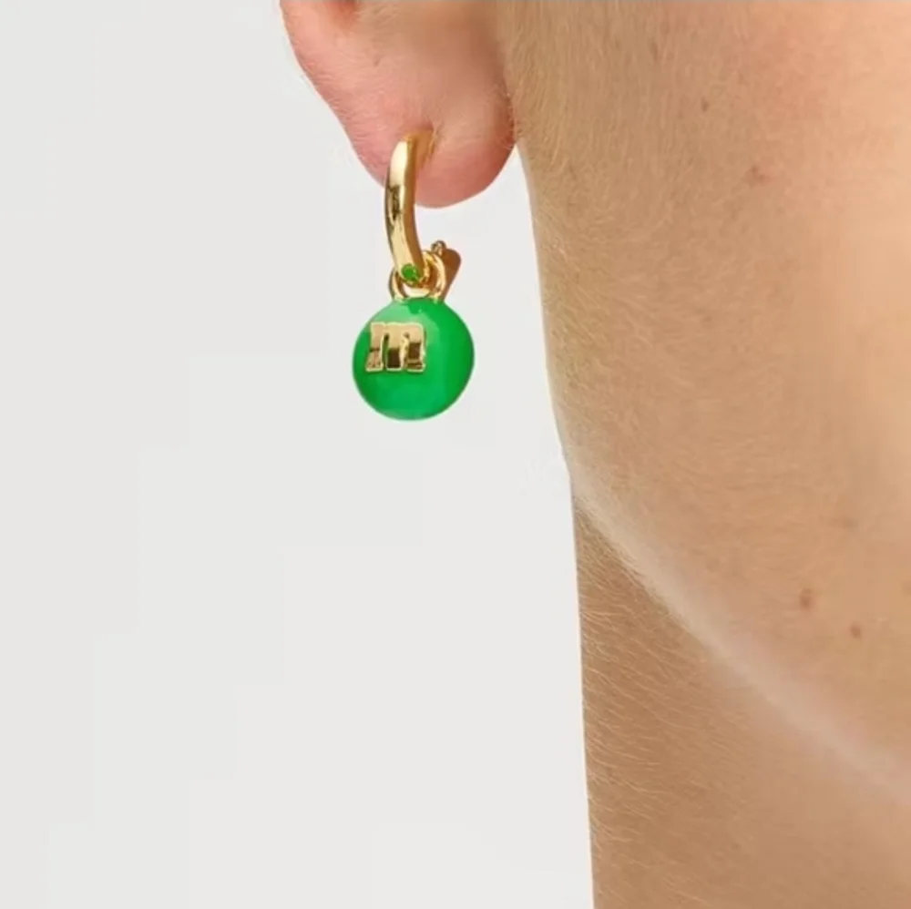 💚▪️Kate Spade▪️ Gold and Green M&M's Charm Huggie Earrings
